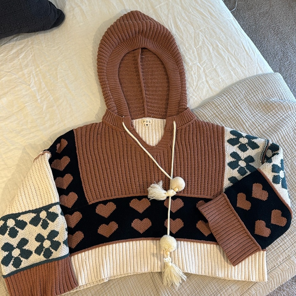 Chunky cozy oversized hooded sweater.